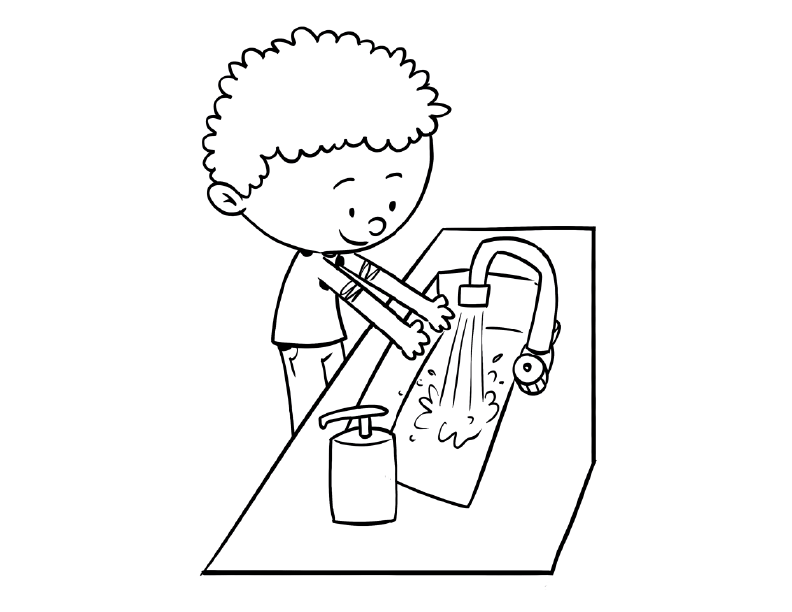 child washing his hands at a sink